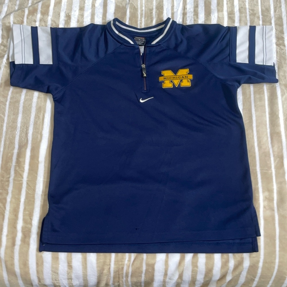 Kids Michigan Nike zip up shirt.